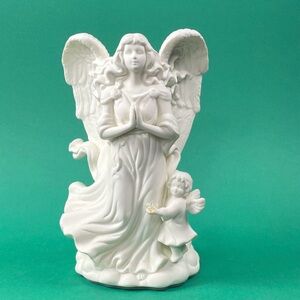 Party lite Angel  candle holder.   With box